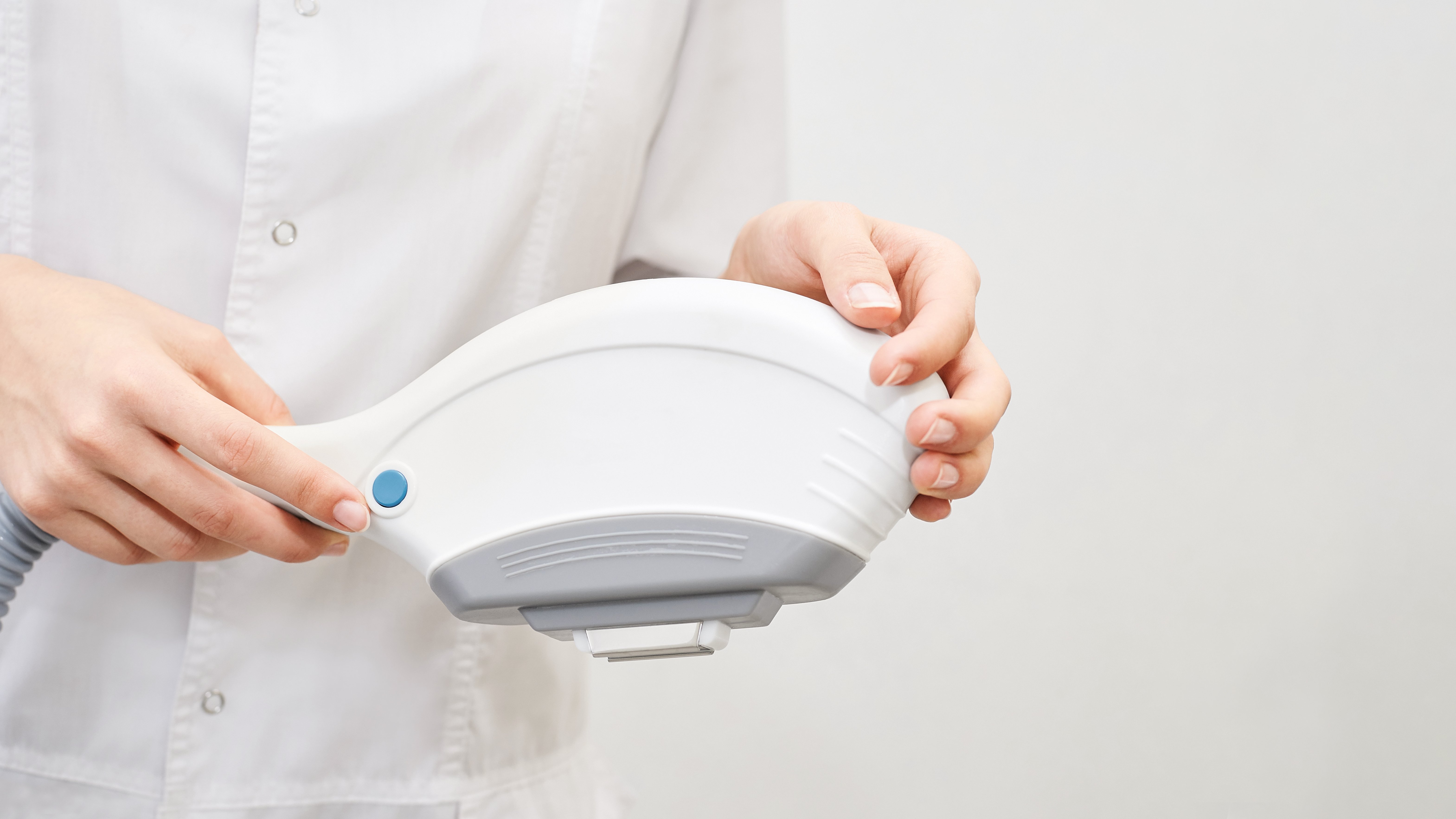 Close-up of a Person Holding an IPL Device